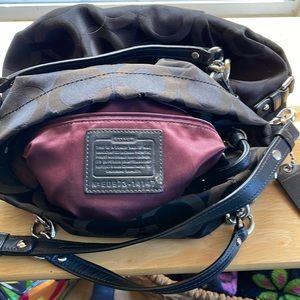 Black Coach bag, slightly used, with burgundy liner